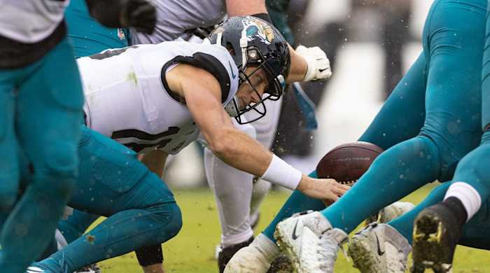 Oct 2, 2022; Philadelphia, Pennsylvania, USA; Jacksonville Jaguars quarterback Trevor Lawrence (16) fumbles the ball during the second quarter against the Philadelphia Eagles at Lincoln Financial Field.